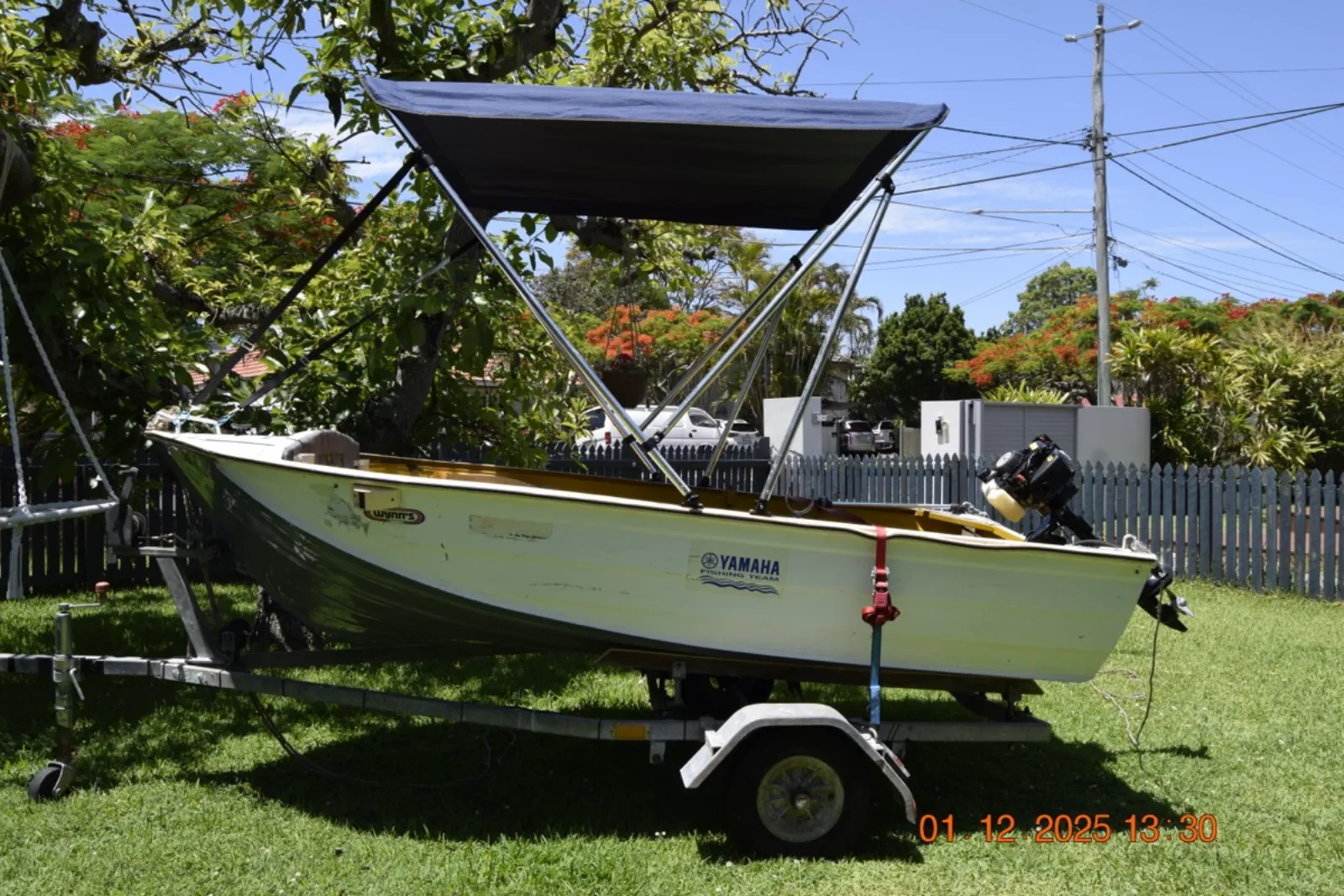 Tinny with Bimini Cover